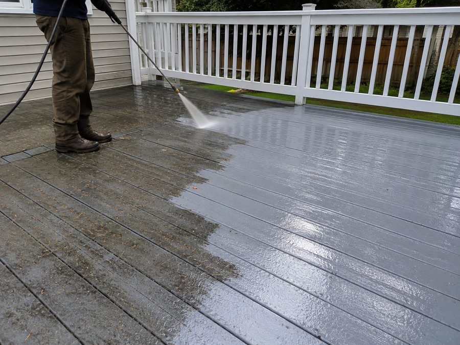 Pressure washing a wood deck