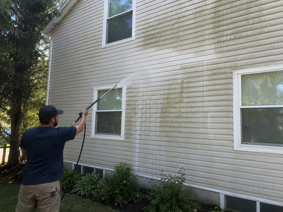 Soft washing a home's siding
